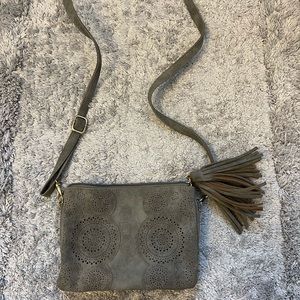 4/$25 Crossbody purse, grey with fringe detail.